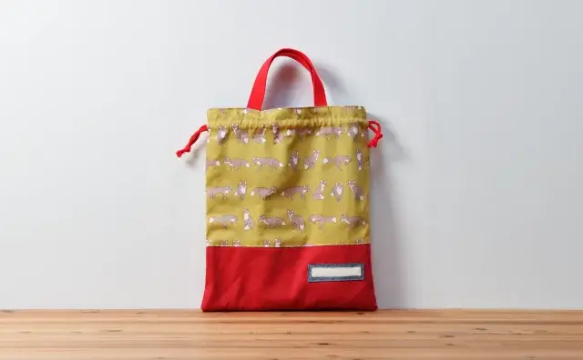 体操服袋（キツネたち、帆布レッド）