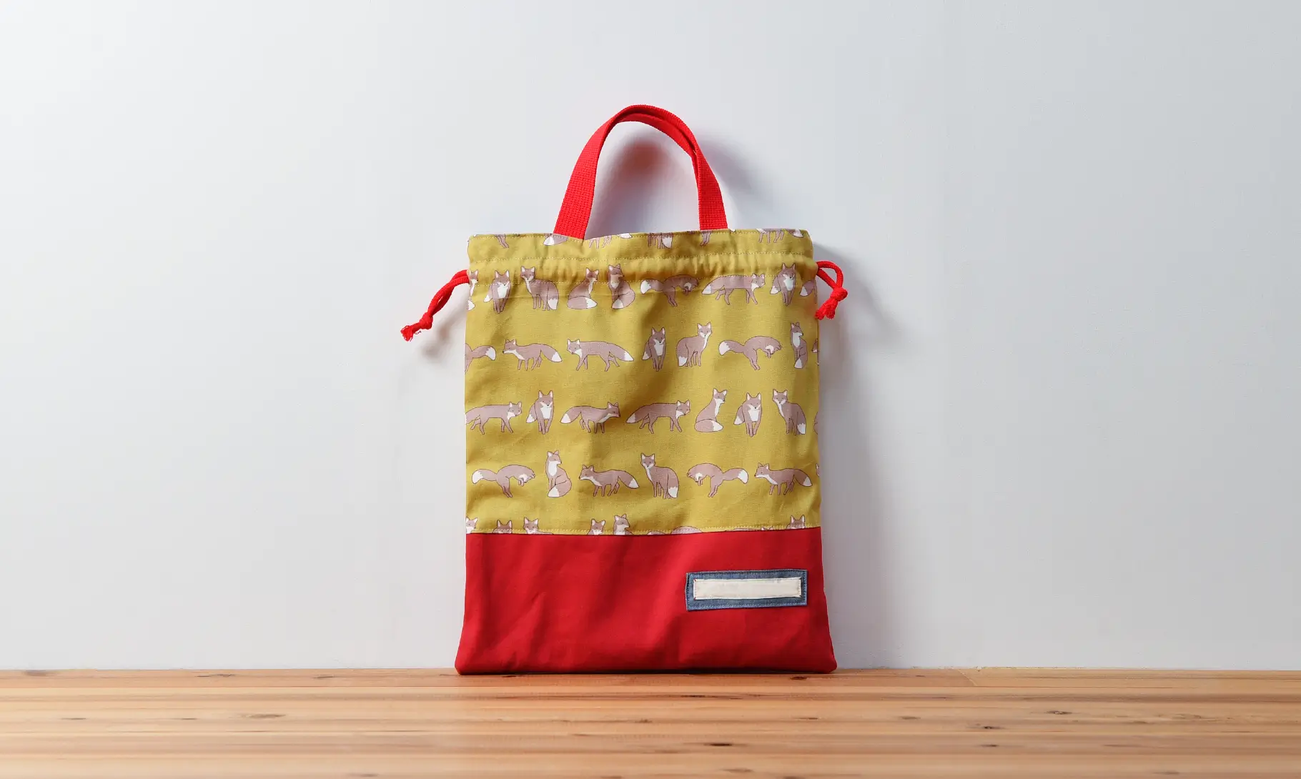 体操服袋（キツネたち、帆布レッド）