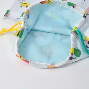 持ち込みの巾着袋カスタム品（お持ち込み生地、絵本の世界）裏地ペールグリーン無地