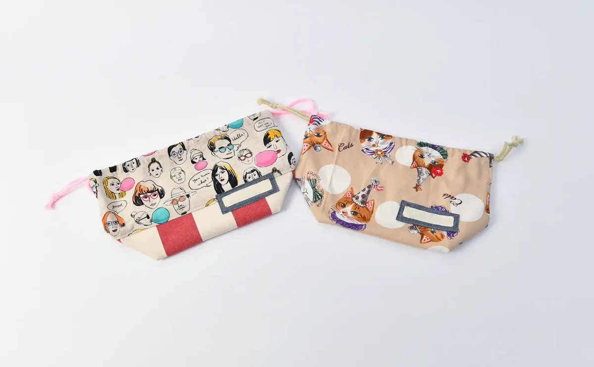 弁当袋（ファニーフェイス、帆布ラージストライプレッド）ひもの色ピンクと（キャットパーティー）ひもの色きなり